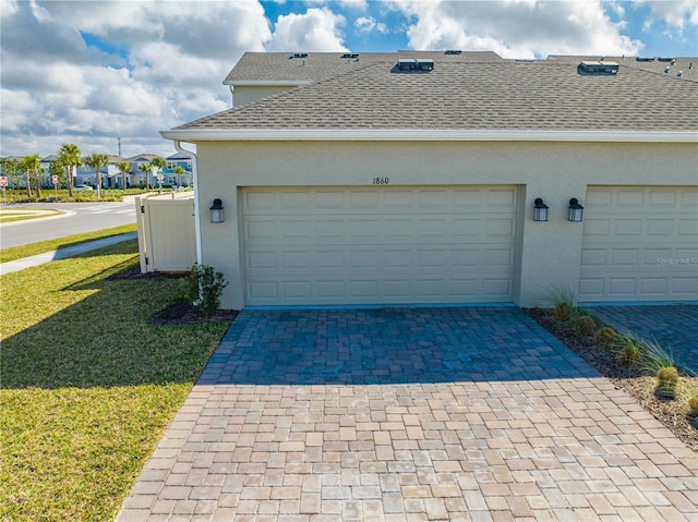 garage with a yard