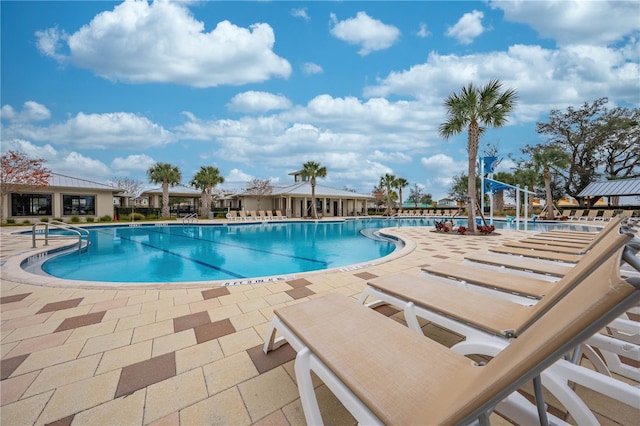 pool with a patio area