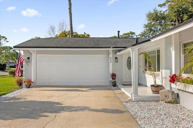 single story home with a garage