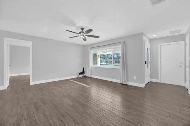 interior space featuring dark hardwood / wood-style flooring and ceiling fan