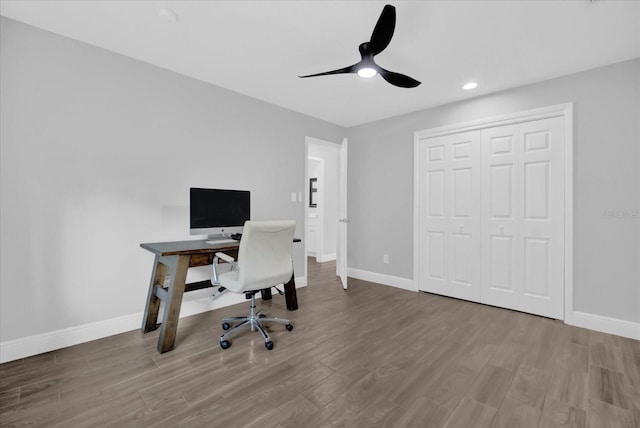 office space featuring hardwood / wood-style floors and ceiling fan