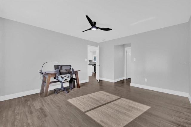 office with hardwood / wood-style flooring and ceiling fan