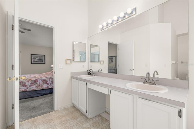 bathroom featuring vanity and ceiling fan