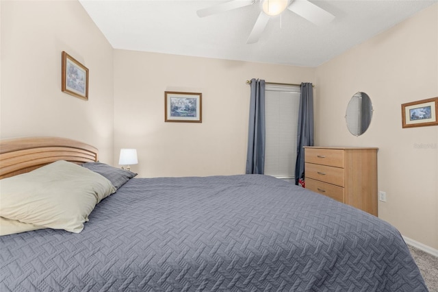 bedroom featuring ceiling fan and carpet floors