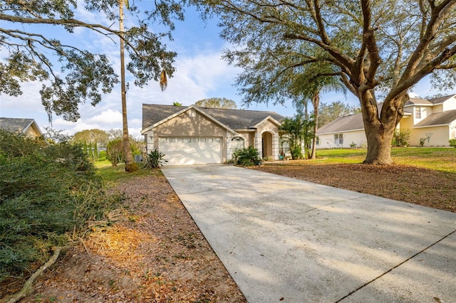 ranch-style home with a garage