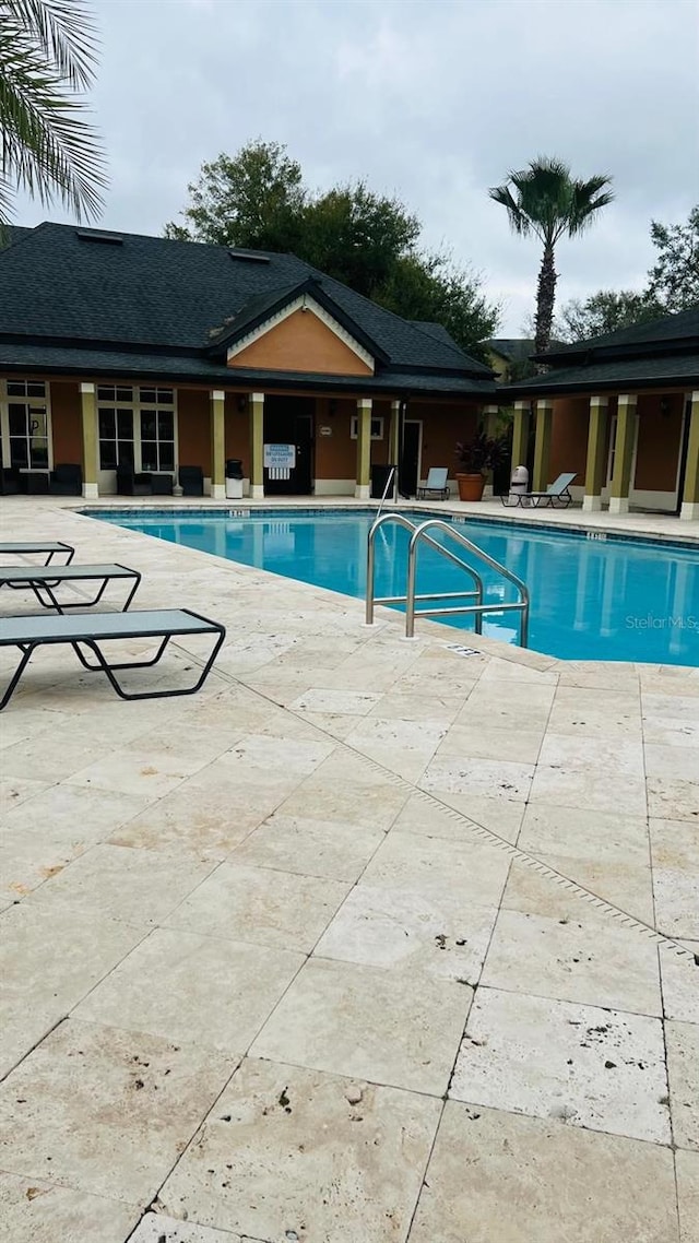 pool featuring a patio