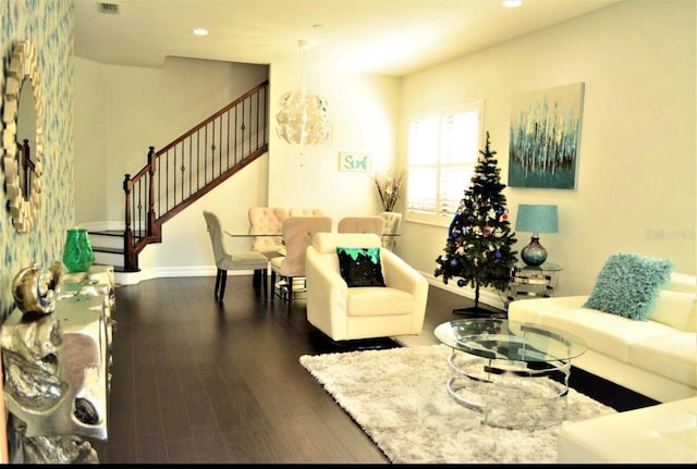 living room with dark hardwood / wood-style floors