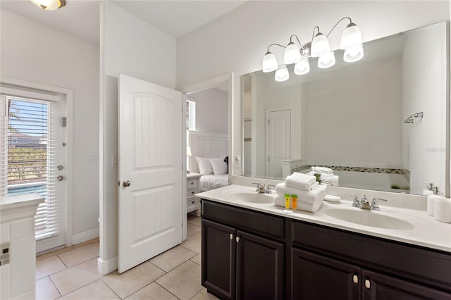 bathroom with vanity and tile patterned floors