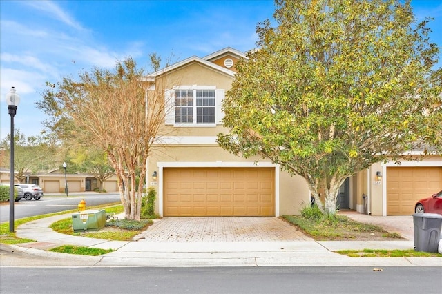 view of front of property with a garage