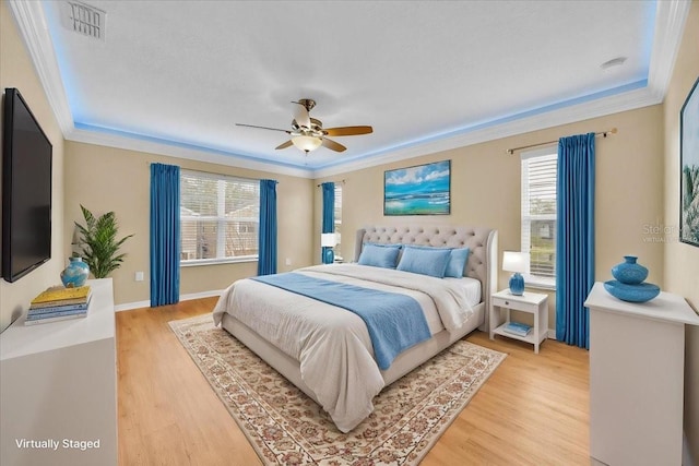 1518 Orrington Payne Pl, Casselberry, FL 32707 - bedroom featuring ceiling fan, ornamental molding, visible vents, and light wood-style floors