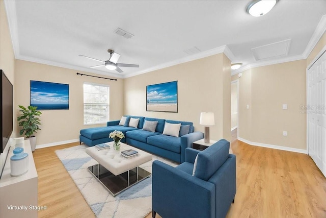 1518 Orrington Payne Pl, Casselberry, FL 32707 - living room featuring baseboards, ornamental molding, light wood finished floors, ceiling fan, and visible vents