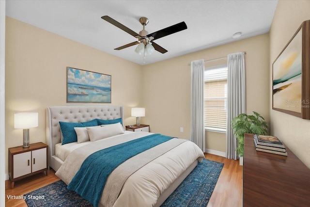 1518 Orrington Payne Pl, Casselberry, FL 32707 - bedroom with a ceiling fan, wood finished floors, and baseboards