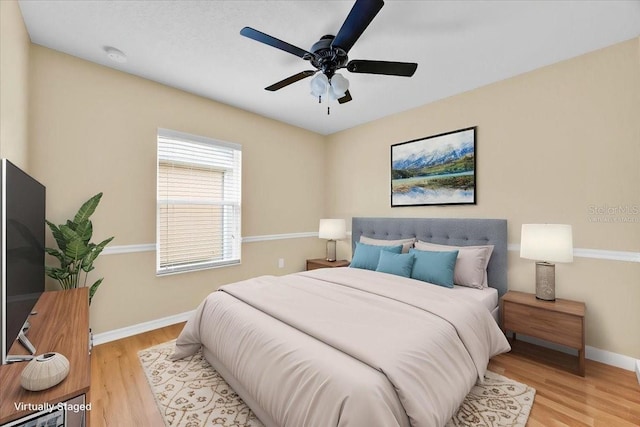1518 Orrington Payne Pl, Casselberry, FL 32707 - bedroom with ceiling fan, baseboards, and light wood-type flooring