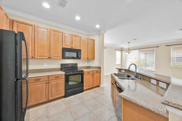 1518 Orrington Payne Pl, Casselberry, FL 32707 - kitchen featuring a sink, black appliances, recessed lighting, crown molding, and light stone countertops