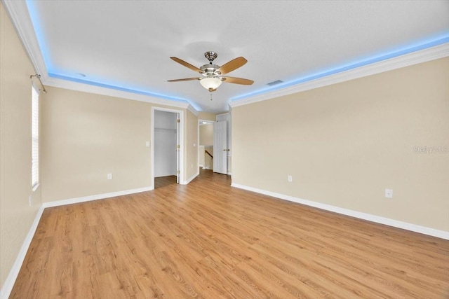 1518 Orrington Payne Pl, Casselberry, FL 32707 - unfurnished bedroom featuring baseboards, light wood-style floors, visible vents, and crown molding