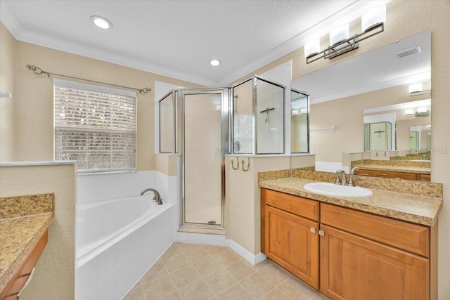 1518 Orrington Payne Pl, Casselberry, FL 32707 - bathroom with a garden tub, visible vents, a shower stall, vanity, and ornamental molding