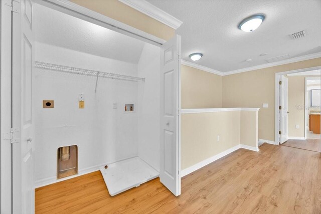 1518 Orrington Payne Pl, Casselberry, FL 32707 - laundry room featuring light wood-style flooring, laundry area, hookup for an electric dryer, hookup for a washing machine, and visible vents