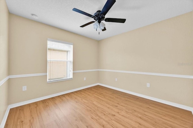 1518 Orrington Payne Pl, Casselberry, FL 32707 - spare room featuring wood finished floors, baseboards, and ceiling fan
