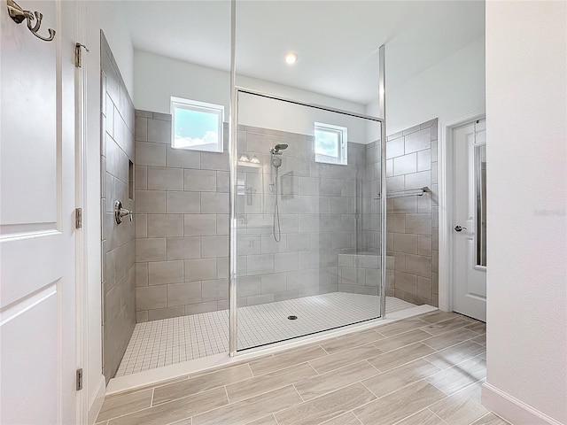 bathroom featuring tiled shower