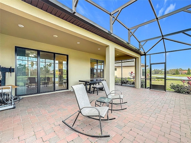 view of patio with a lanai