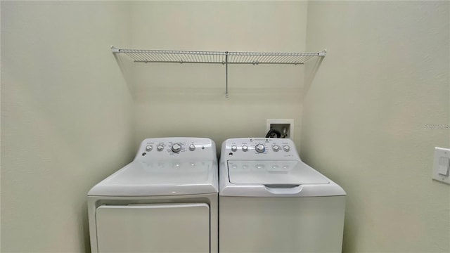 laundry area with laundry area and washing machine and dryer