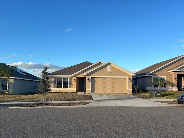 ranch-style house featuring a garage