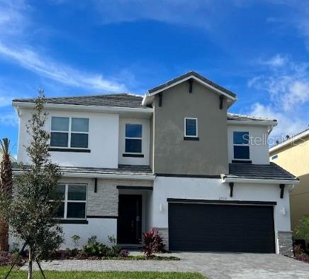 view of front of property with a garage