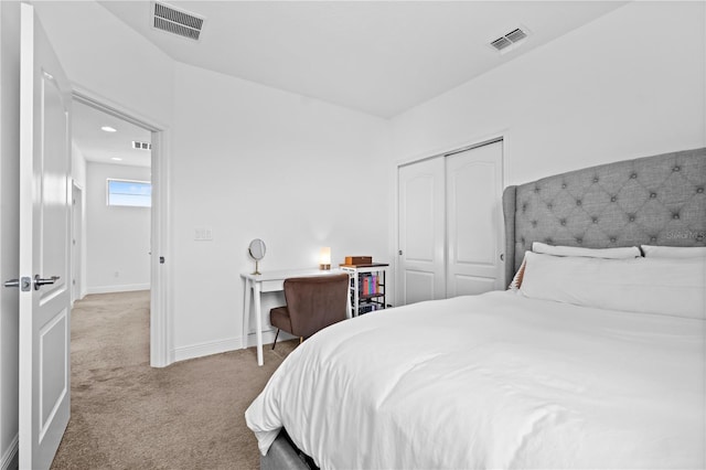 bedroom with baseboards, visible vents, and carpet floors