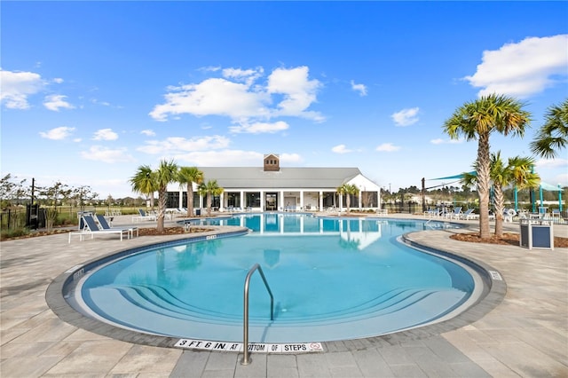 community pool featuring a patio