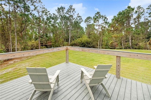 deck featuring a lawn