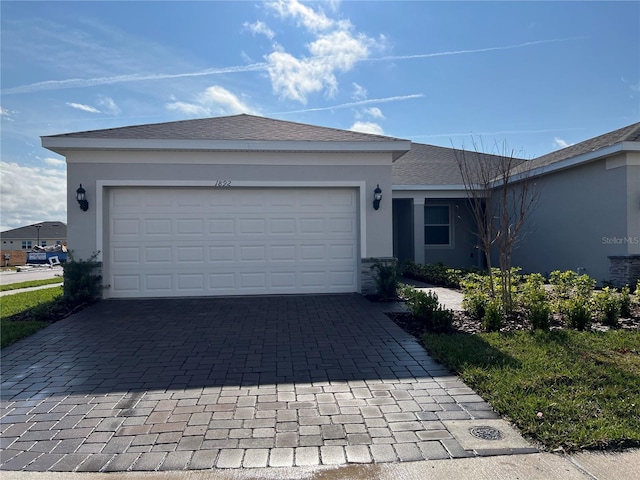 single story home with a garage