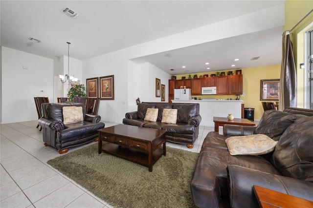 7735 Teascone Blvd, Kissimmee, FL 34747 - living area with light tile patterned floors, a chandelier, and recessed lighting