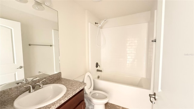 full bathroom featuring vanity, toilet, and washtub / shower combination