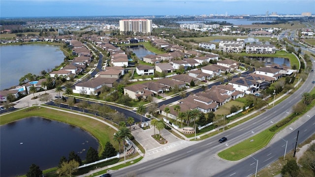 aerial view with a water view and a residential view