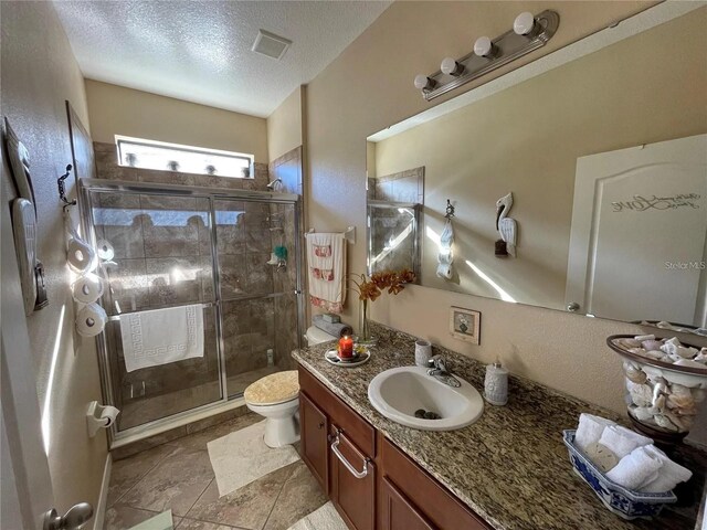 1820 Trophy Bass Way, Kissimmee, FL 34746 - full bath featuring vanity, a stall shower, visible vents, and a textured ceiling