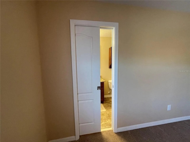 1820 Trophy Bass Way, Kissimmee, FL 34746 - unfurnished room featuring baseboards and carpet floors