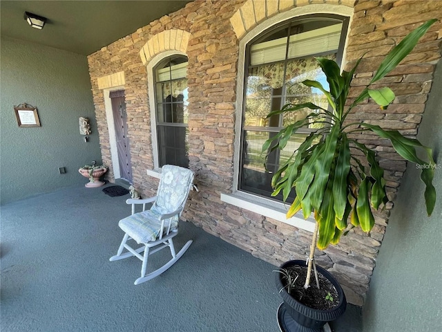 1820 Trophy Bass Way, Kissimmee, FL 34746 - view of patio with a porch