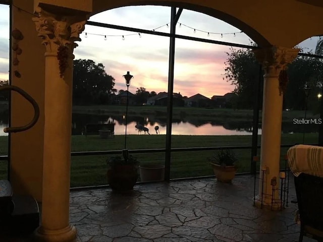 1820 Trophy Bass Way, Kissimmee, FL 34746 - exterior space with arched walkways and a water view