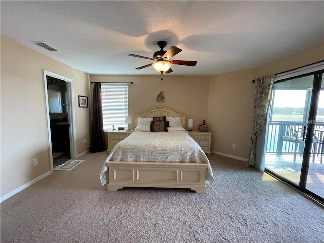 1820 Trophy Bass Way, Kissimmee, FL 34746 - bedroom with access to outside, multiple windows, visible vents, and a textured ceiling