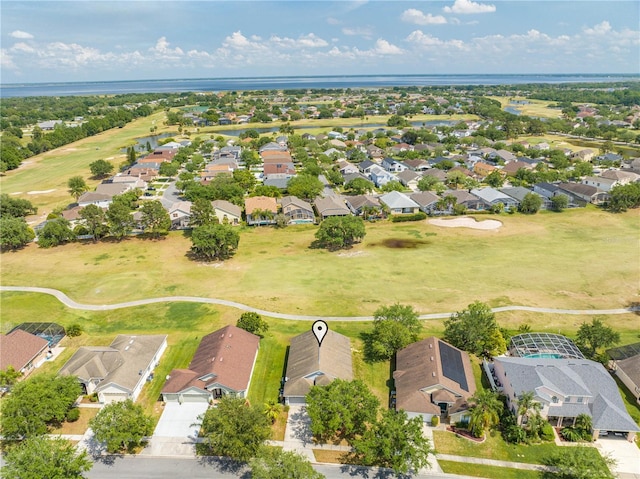 birds eye view of property with a residential view