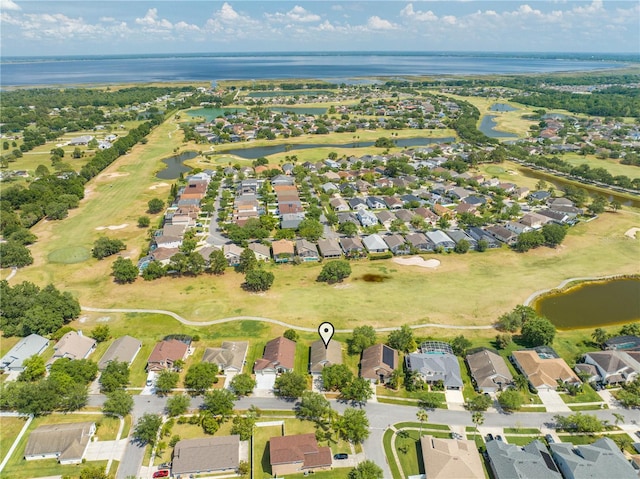 aerial view with a water view and a residential view