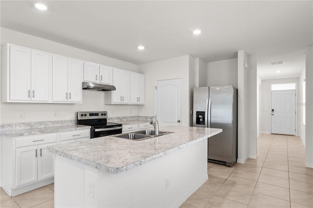 kitchen featuring a center island with sink, appliances with stainless steel finishes, sink, light tile patterned floors, and white cabinets