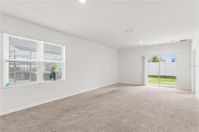 unfurnished room with carpet