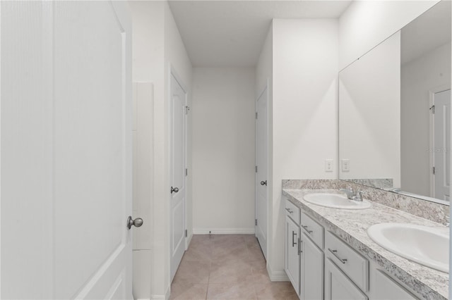 bathroom featuring vanity and tile patterned flooring