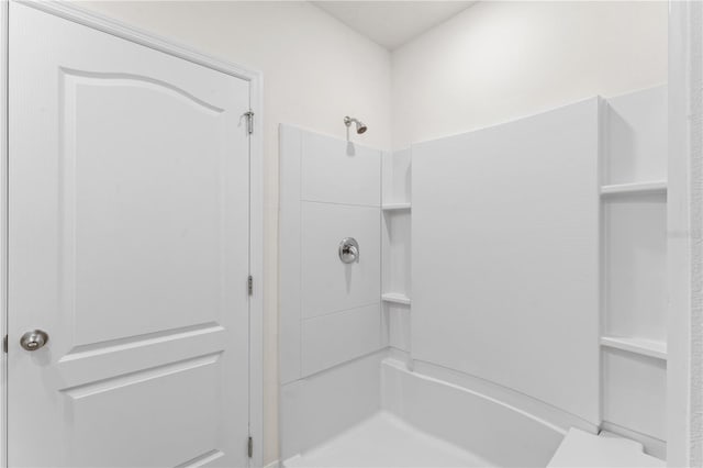 bathroom featuring walk in shower