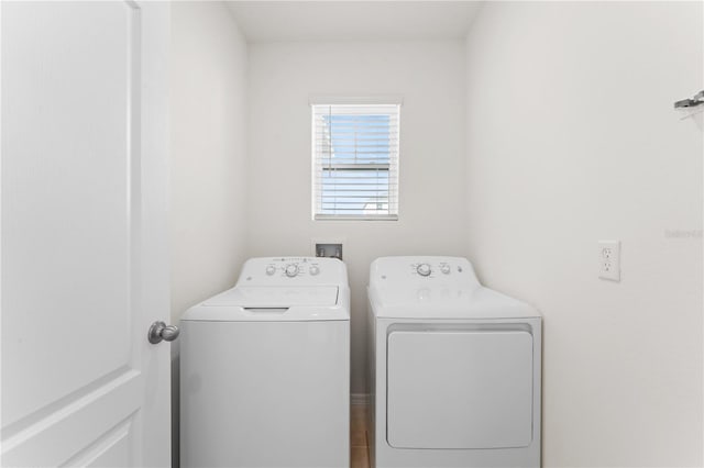 washroom featuring independent washer and dryer