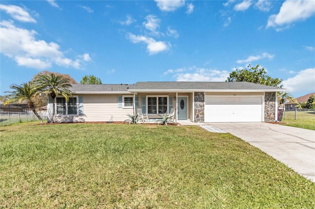 ranch-style house with a garage, driveway, stone siding, fence, and a front lawn