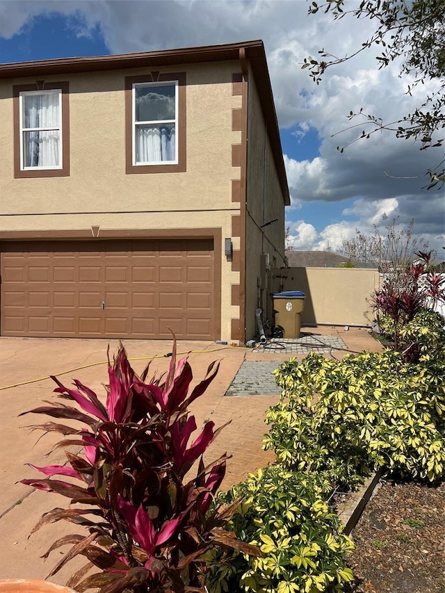 view of front of property with a garage