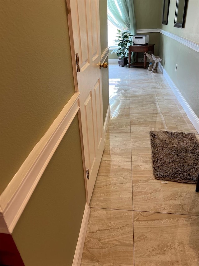350 Corsica Ct, Kissimmee, FL 34758 - corridor with baseboards and marble finish floor