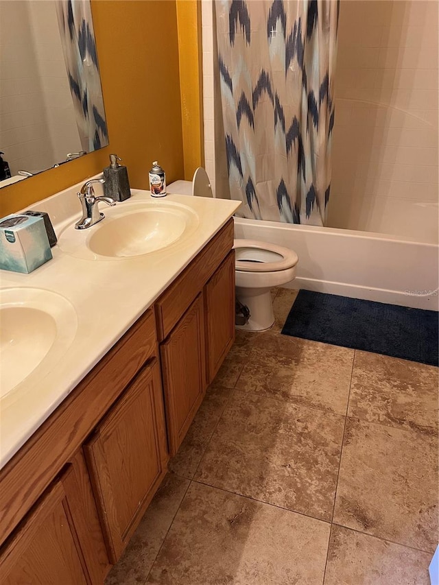 350 Corsica Ct, Kissimmee, FL 34758 - bathroom with toilet, double vanity, a sink, and shower / tub combo with curtain
